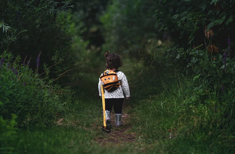 Woman walking in a forest